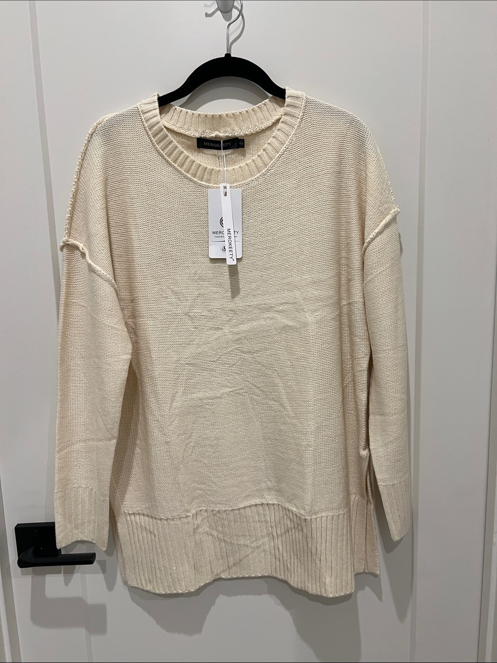 Long ivory sweater